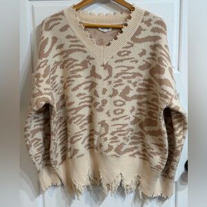 ADORA Women's V-Neck Sweater in Beige and Cream